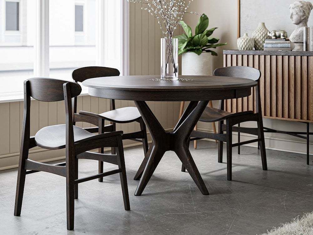 Stamford dining table and side chairs in a room setting.