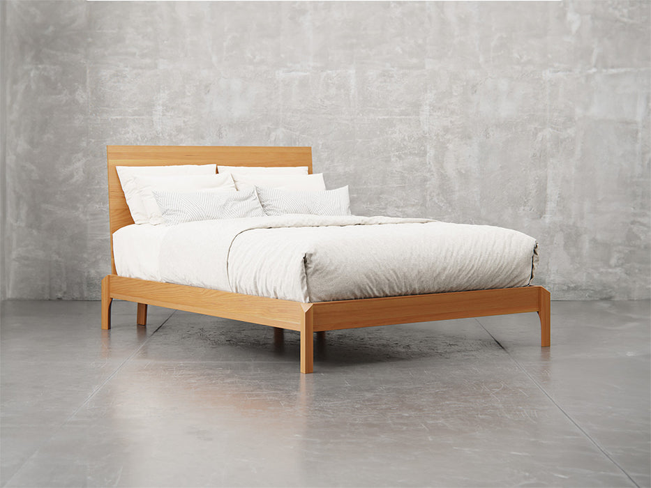 Nashville bed angle view in natural cherry finish.