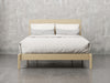 Nashville bed front view in natural hard maple finish.
