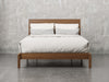 Nashville bed front view in natural walnut finish.