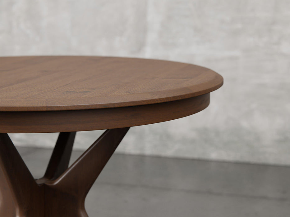 Stamford dining table close up view in earthtone stain.
