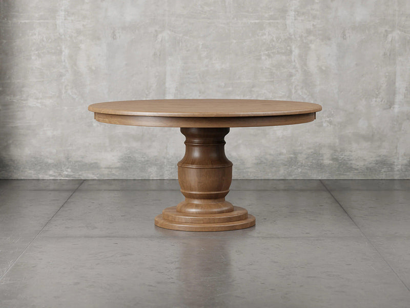 Augusta pedestal dining table front view in almond stain.