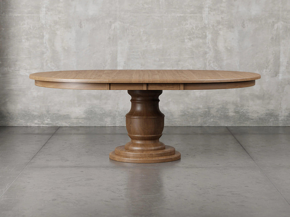 Augusta pedestal dining table front view with leaf in almond stain.