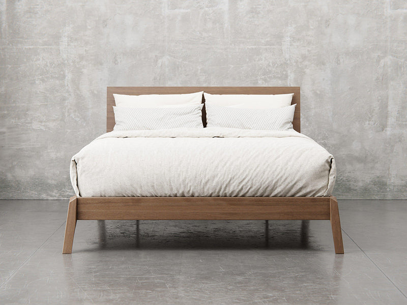 Bellevue bed frame front view in almond stain.