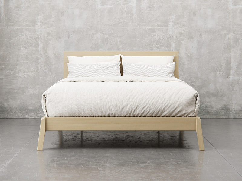Bellevue bed frame front view in natural brown maple finish.