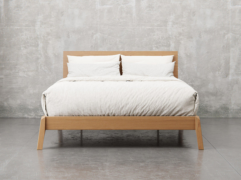 Bellevue bed frame front view in sealy stain.