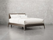 Bellevue bed frame angle view in shadow stain.