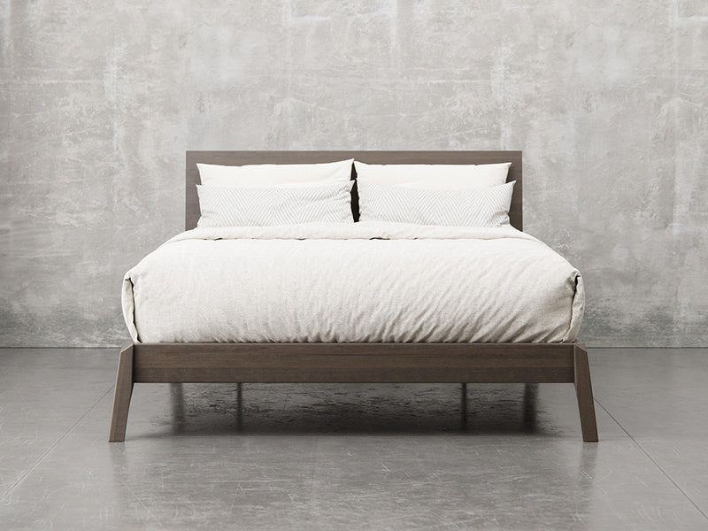 Bellevue bed frame front view in shadow stain.