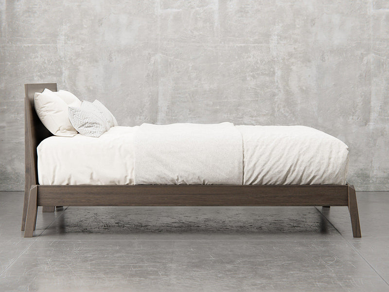 Bellevue bed frame side view in shadow stain.