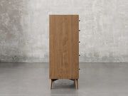 Bellevue chest side view in almond stain.