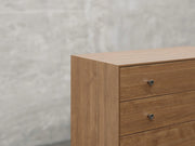 Bellevue chest zoomed in view in almond stain.