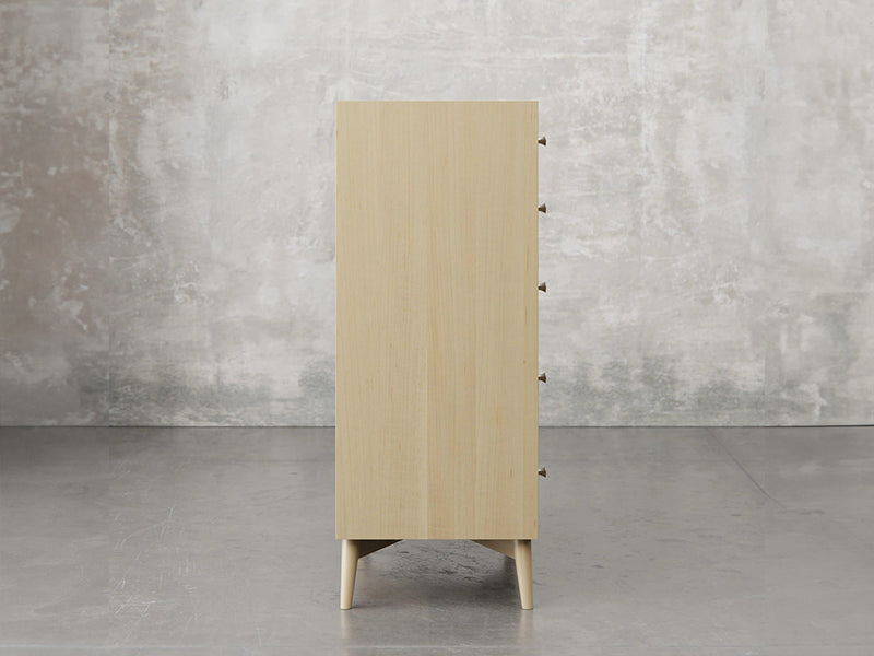 Bellevue chest side view in natural brown maple finish.