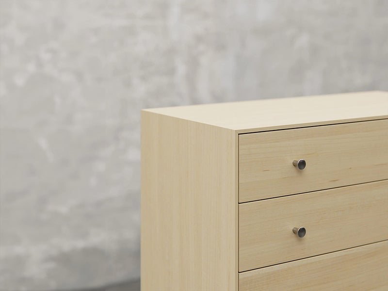 Bellevue chest close up view in natural brown maple finish.