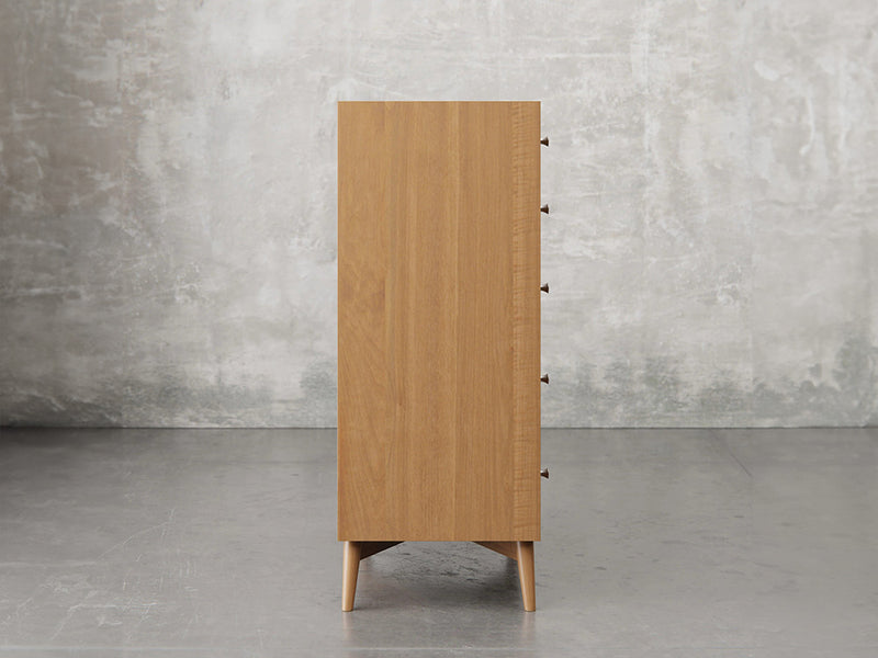 Bellevue chest side view in sealy stain.