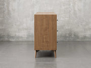 Bellevue chest side view in almond stain.