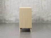 Bellevue dresser side view in natural brown maple finish.