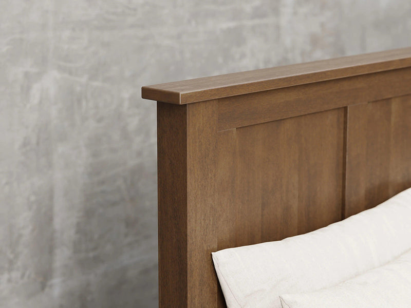 Lansing bed close up view in cappuccino stain.