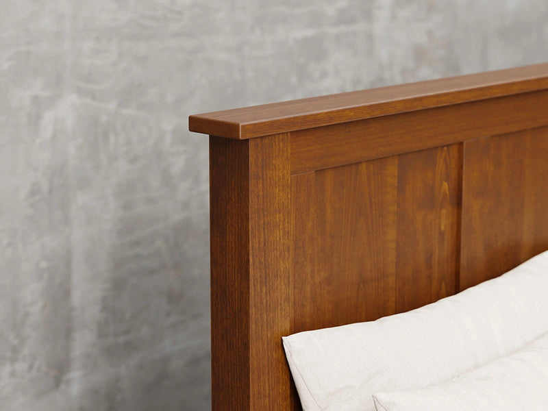 Lansing bed close up view in Michael's cherry stain.