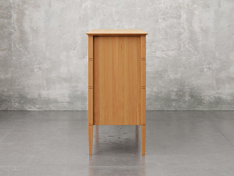 Nashville dresser side view in natural cherry finish.