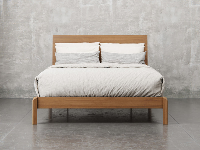 Nashville bed front view in brown maple, almond finish.