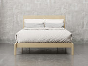 Nashville bed front view in natural hard maple finish.
