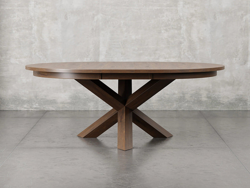 Pittsburgh round dining table with leaf in cappuccino stain.