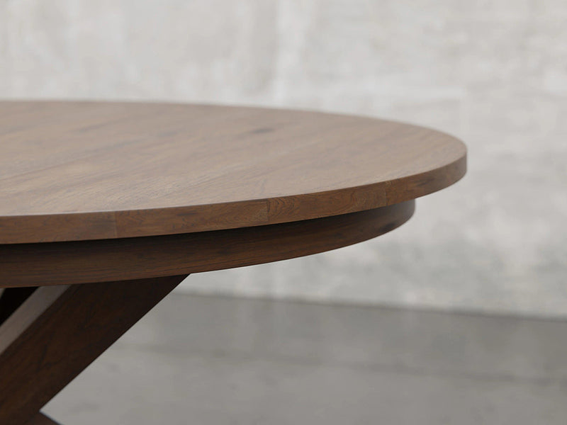 Pittsburgh round dining table close up view in cappuccino stain.