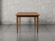 Raleigh shaker leg dining table side view in Michael's cherry stain.