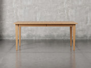 Raleigh shaker leg dining table front view in sealy stain.