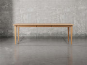 Raleigh shaker leg dining table with leaf in sealy stain.