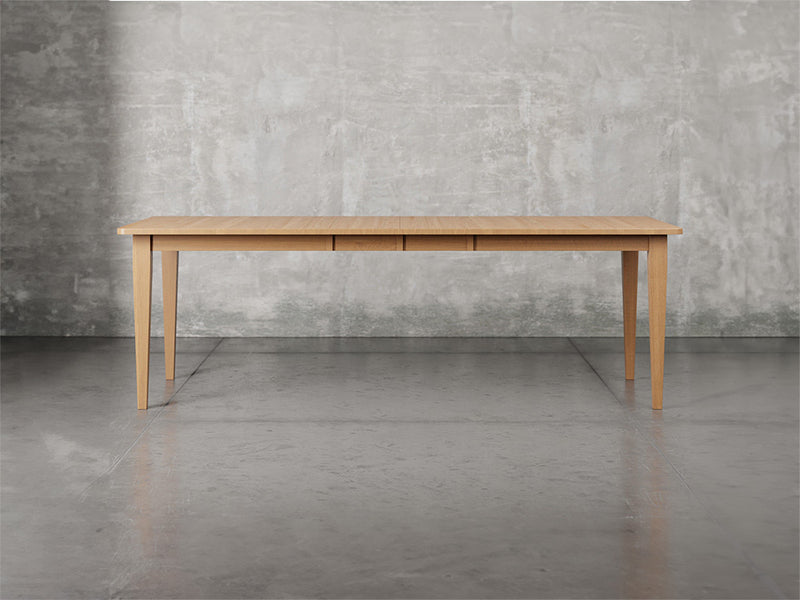 Raleigh shaker leg dining table with leaf in sealy stain.