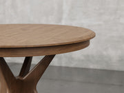 Stamford dining table close up view in almond stain.